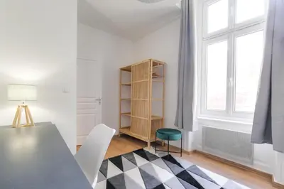 Un ou plusieurs lits dans un hébergement de l'établissement Superbe appartement sur la Presqu'île - Lyon