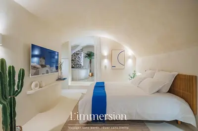Un ou plusieurs lits dans un hébergement de l'établissement Hélios, Suite Grecque & Spa