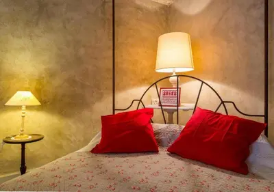 Un ou plusieurs lits dans un hébergement de l'établissement Maison Authentique 6 pers Terrasse Parking, WiFi Accès Péage facile 12 min VIENNE