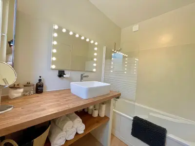 Salle de bains dans l'établissement Le Ciné-Club - Appartement signature