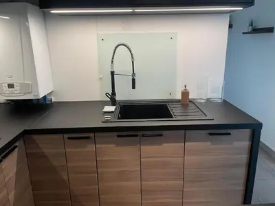 Cuisine ou kitchenette dans l'établissement Bienvenue, charmant lieu cosy