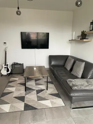 Télévision ou salle de divertissement dans l'établissement Bienvenue, charmant lieu cosy