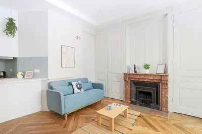 Coin salon dans l'établissement Studio cosy et pratique, proche métro, par de la tête d'or