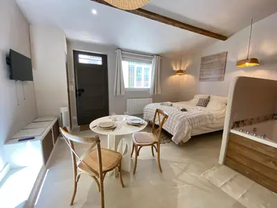 Un ou plusieurs lits dans un hébergement de l'établissement CRAFT HOME - Studio - BALNEO - PARKING privé