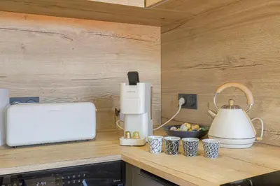 Cuisine ou kitchenette dans l'établissement Cosy et Calme proche Lyon