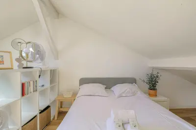Un ou plusieurs lits dans un hébergement de l'établissement Cosy et Calme proche Part-Dieu
