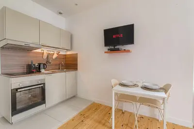 Cuisine ou kitchenette dans l'établissement Design et Cosy à 10 mins métro Gratte-Ciel