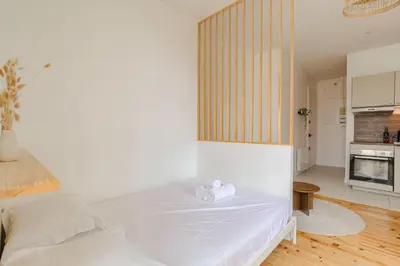 Cuisine ou kitchenette dans l'établissement Design et Cosy à 10 mins métro Gratte-Ciel