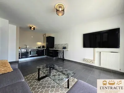 Télévision ou salle de divertissement dans l'établissement Apartment Groupama Stadium LDLC ARENA EUREXPO