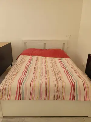 Un ou plusieurs lits dans un hébergement de l'établissement Chambre et salle de bain autonome dans notre maison