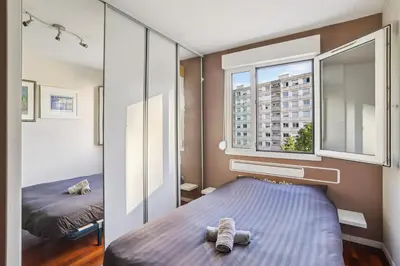 Un ou plusieurs lits dans un hébergement de l'établissement Charmant Appartement T2 - Garage