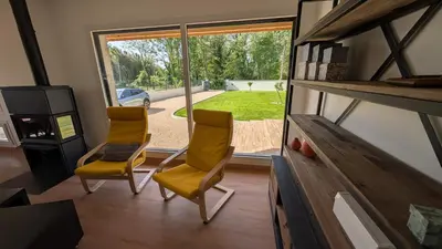 Coin salon dans l'établissement Belle Maison, calme avec parking