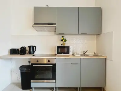 Cuisine ou kitchenette dans l'établissement Terrazzo - Appartement 6 personnes - Check in h24 & Wifi