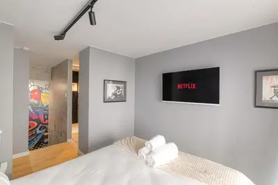 Un ou plusieurs lits dans un hébergement de l'établissement Cosy et Charmant duplex Brotteaux - Masséna