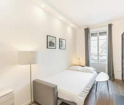 Un ou plusieurs lits dans un hébergement de l'établissement Le Nid de Perrache Comfortable and Stylish Studio
