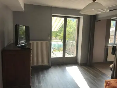 Télévision ou salle de divertissement dans l'établissement Gîte de TROZIER