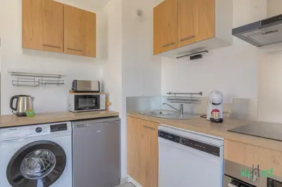 Cuisine ou kitchenette dans l'établissement Confort et tranquillité à Dardilly