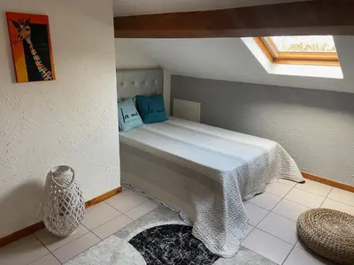 Un ou plusieurs lits dans un hébergement de l'établissement maison aux portes du Beaujolais