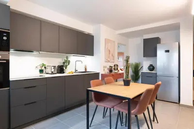 Cuisine ou kitchenette dans l'établissement Les Tilleuls II