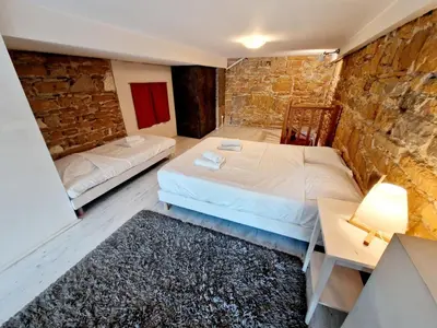Un ou plusieurs lits dans un hébergement de l'établissement Grand duplex 5 pers au cœur de Lyon Opéra & métro