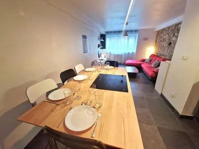 Coin salon dans l'établissement Grand duplex 5 pers au cœur de Lyon Opéra & métro
