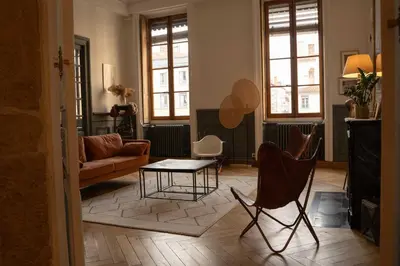 Coin salon dans l'établissement Appartement L'Écrin d'Ainay - Welkeys