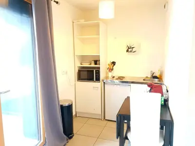 Cuisine ou kitchenette dans l'établissement Le Contemporain - Wifi - Proche centre ville