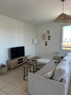 Télévision ou salle de divertissement dans l'établissement Appartement T3