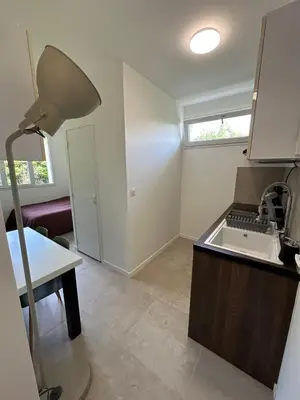 Cuisine ou kitchenette dans l'établissement Studio CASA COCO-2pers Béligneux