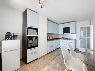 Cuisine ou kitchenette dans l'établissement Grand T3, balcon et garage - Venissieux Lyon Sud