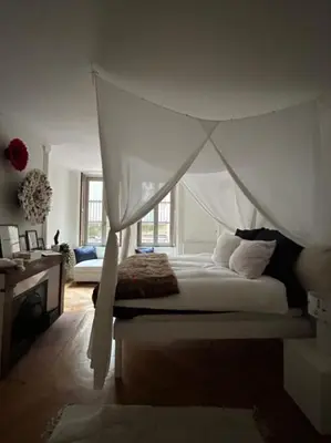 Un ou plusieurs lits dans un hébergement de l'établissement Le Cosy - Grand appartement centre Bellecour