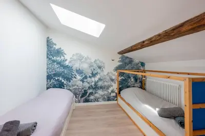 Un ou plusieurs lits dans un hébergement de l'établissement Superbe 4 pièces, 90m2 - Vieux Lyon - Vue Panoramique