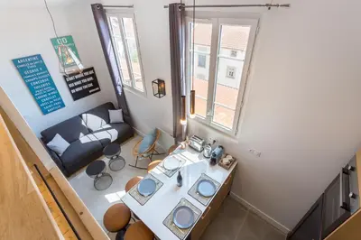 Coin salon dans l'établissement Belfort- Duplex