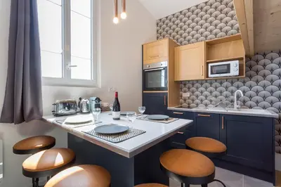 Cuisine ou kitchenette dans l'établissement Belfort- Duplex