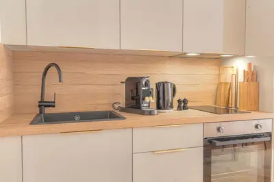 Cuisine ou kitchenette dans l'établissement Design et Cosy 2 min Terreaux