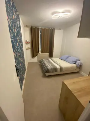Un ou plusieurs lits dans un hébergement de l'établissement Appartement 2 chambres 5 pièces paisible