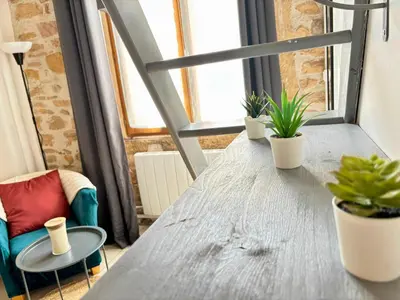 Coin salon dans l'établissement Urban'Mezza Spot - Lyon Valmy - Wi-Fi & Metro