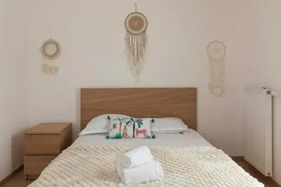 Un ou plusieurs lits dans un hébergement de l'établissement Charming Apartment 2BR 4P - Near to Lyon