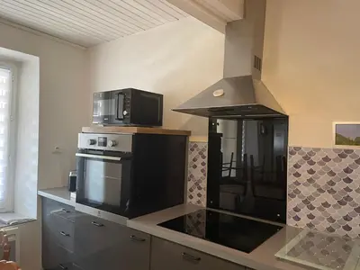 Cuisine ou kitchenette dans l'établissement Maison 5 chambres proche Lyon CNPE Bugey