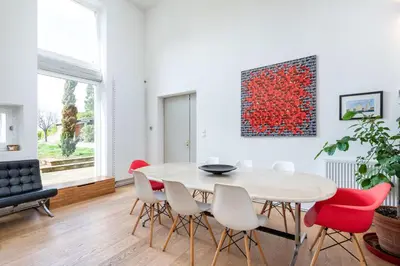 Coin salon dans l'établissement Le Cerf - House with view and swimming pool