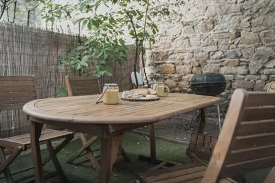 Terrasse ou espace extérieur de l'établissement Appartement cosy 38 m2 avec jardin de 21 m2