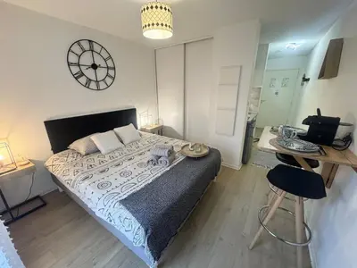 Un ou plusieurs lits dans un hébergement de l'établissement Appartement Le Boheme