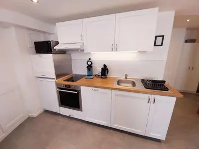 Cuisine ou kitchenette dans l'établissement Les fontaines d'or