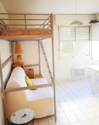 Un ou plusieurs lits dans un hébergement de l'établissement Studio Calme 3pers 2 couchages au Coeur de Villefranche proche Lyon