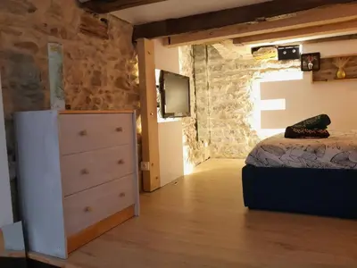 Télévision ou salle de divertissement dans l'établissement Appartement de Christopher