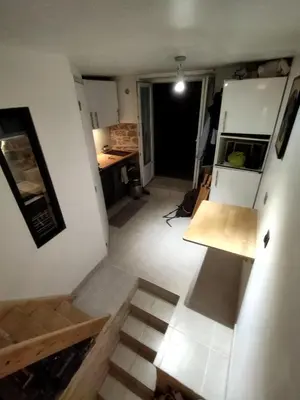 Un ou plusieurs lits dans un hébergement de l'établissement Appartement de Christopher