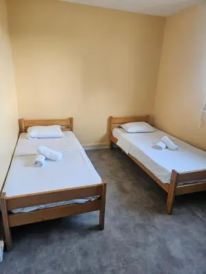 Un ou plusieurs lits dans un hébergement de l'établissement Apartment 2 minutes from Groupama