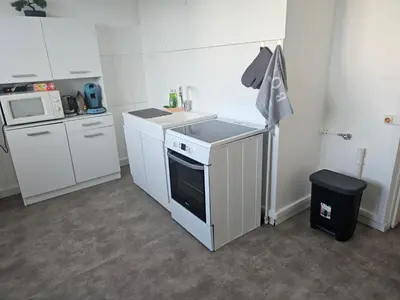 Cuisine ou kitchenette dans l'établissement Apartment 2 minutes from Groupama