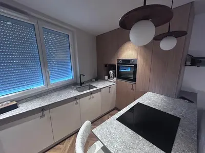 Cuisine ou kitchenette dans l'établissement La Demi Lune
