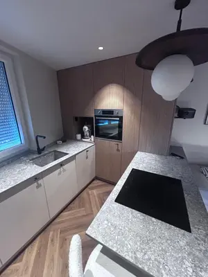 Cuisine ou kitchenette dans l'établissement La Demi Lune